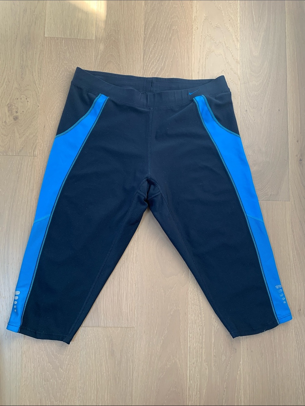 Nike Black Athletic Shorts with Bright Blue Side Panels
